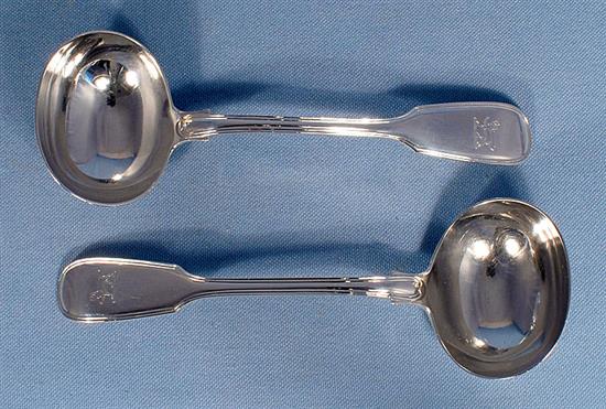 A set of four Victorian silver fiddle pattern sauce ladles, by Elizabeth Eaton, Length: 185mm Combined weight 11.3oz/352grms